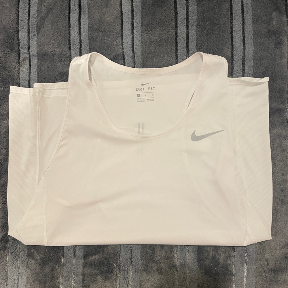 Women’s Nike Dri-Fit, small size tank top. Barley used!